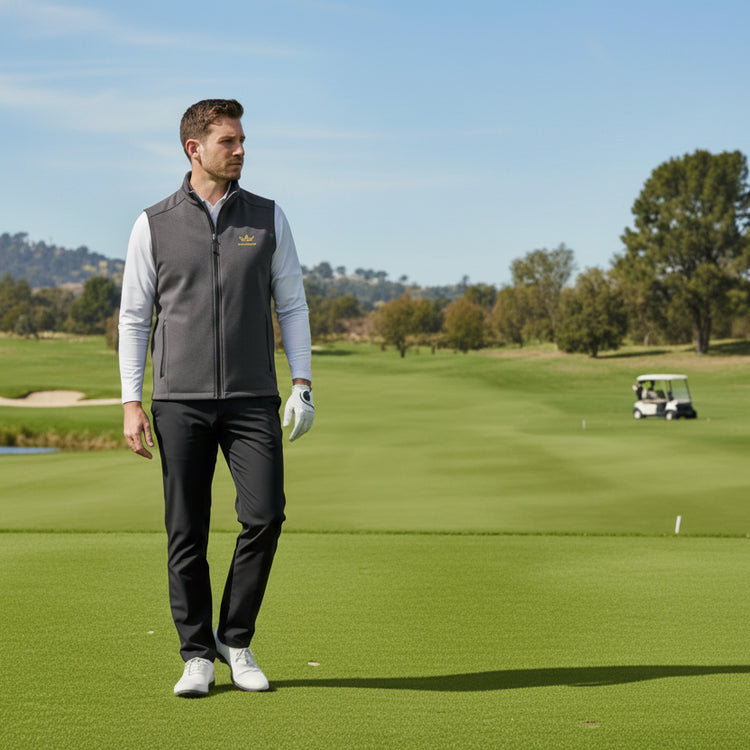 Soft shell vest with zip front, stand collar, and zippered pockets